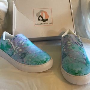 Slip on tennis shoes. Designed by artist.size 7